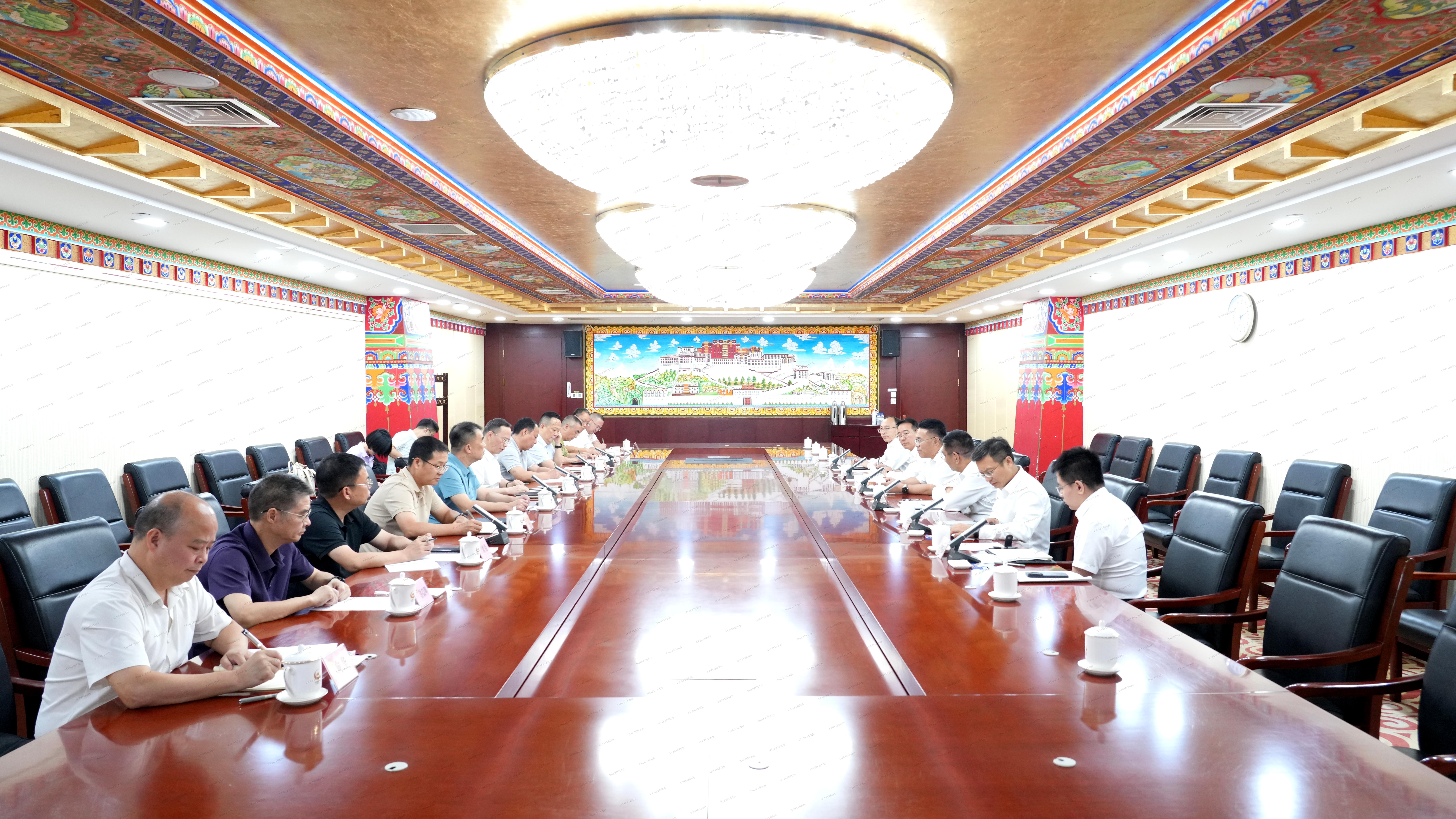 周洲会见湖南省地质院党委书记谈文胜一行